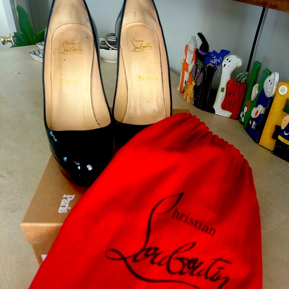 Loved Christian Louboutin Patent Leather Shoes.
